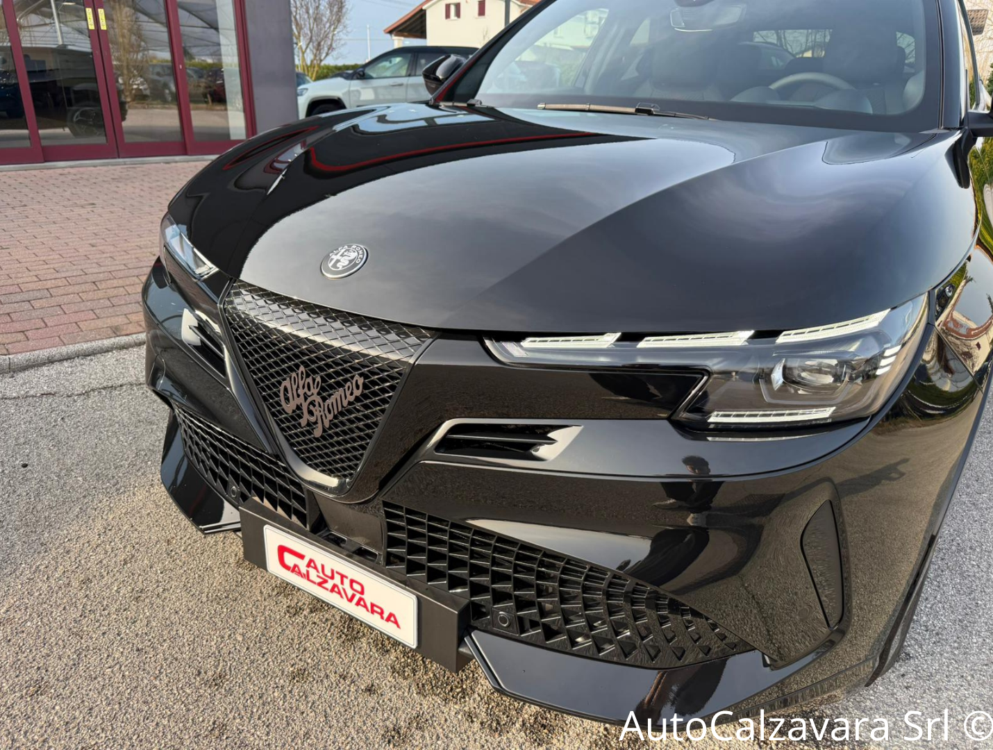 Alfa Romeo Junior 1.2 145 CV Hybrid eDCT6 Q4 / NERO TORTONA / RJA40548